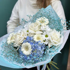 Delicate bouquet with hydrangea and French roses