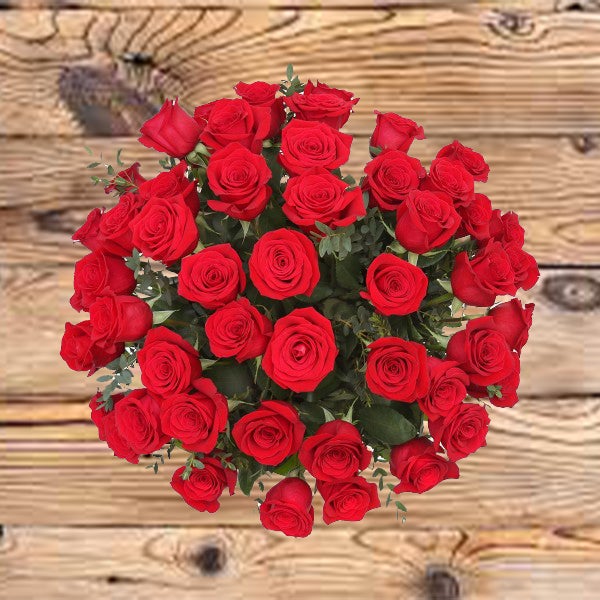 Valentine 50 Long Stem Red Roses in a vase  & 250 Gram  Patchi Chocolates
