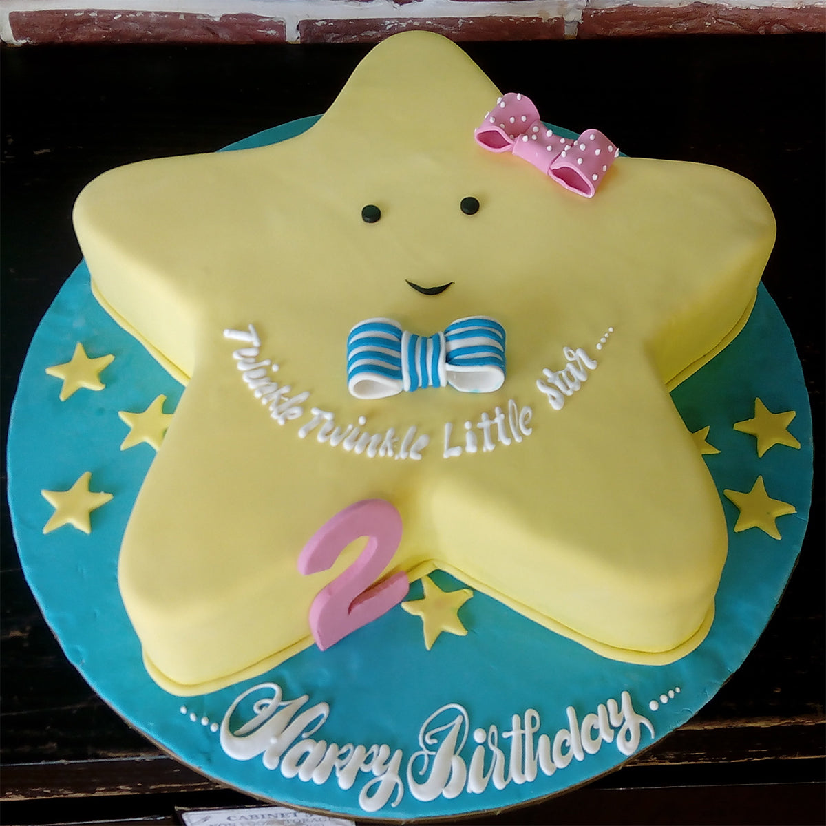 Premium Photo | Decor on the birthday cake with gold stars